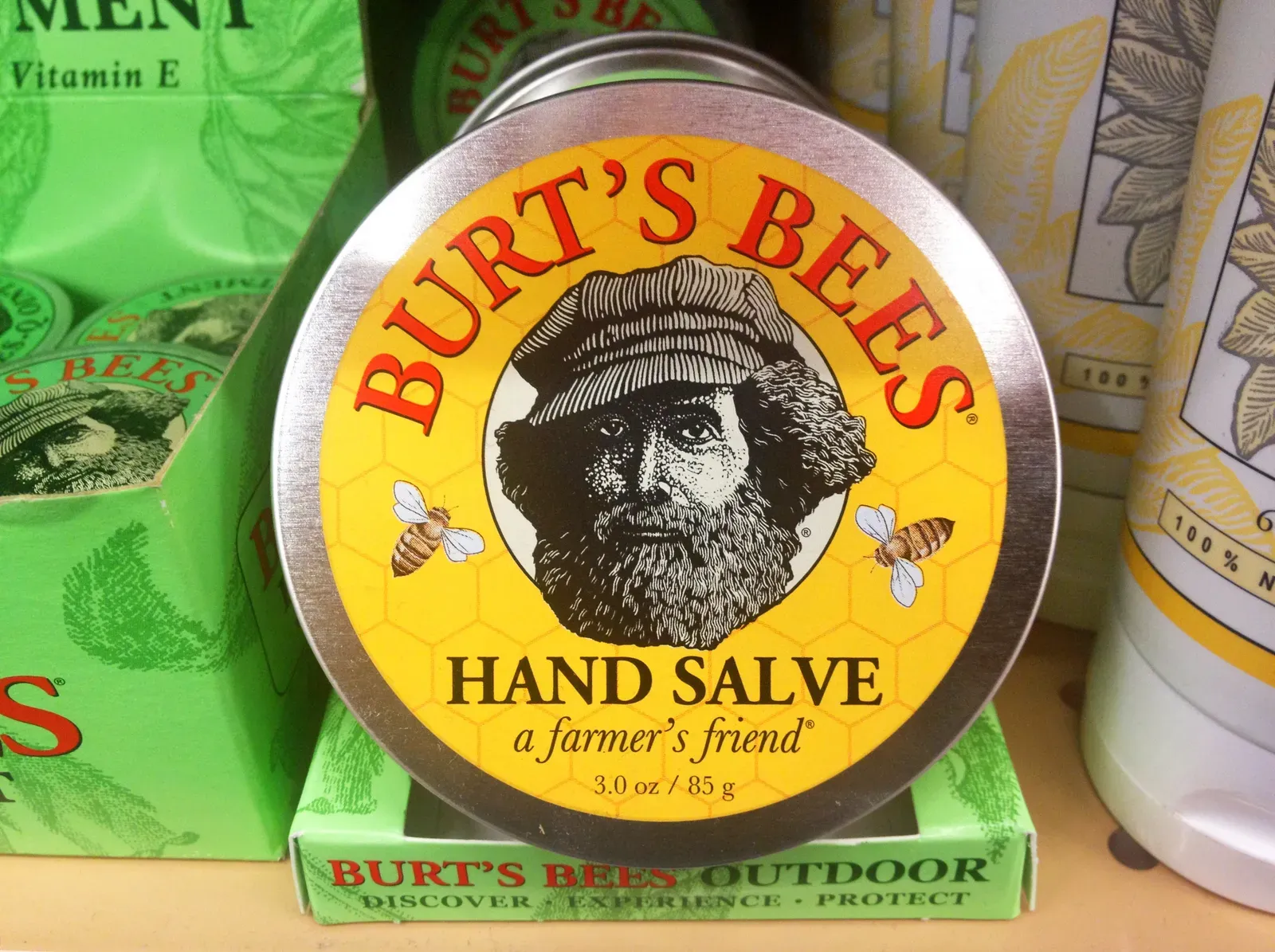 A tin of Burt's Bees Hand Salve, one of the five products in the kit (full-size tin shown)